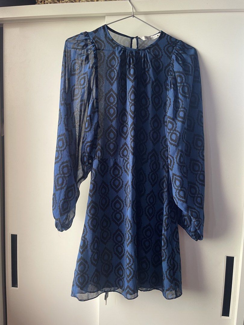 Zara Blue Ethnic Dress (Category: Dresses) located in Manila. Submitted by chenpots (Listing ID 1421840309, Image 1). Description: - Blue and black patterned dress - Long sleeves - Round neckline - Back zipper closure - Size: S (EUR S, MEX 26) - Made in Morocco.