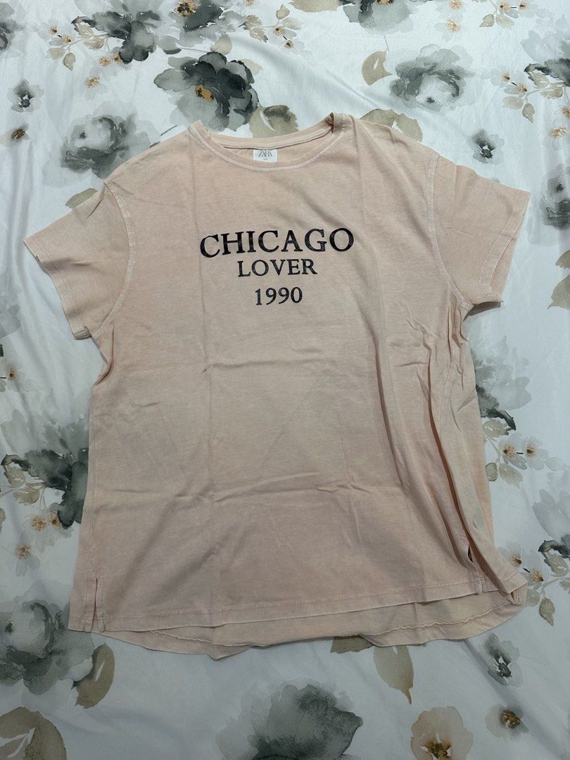 Zara Kids T-shirt (Category: Shirts) located in Quezon City. Submitted by timelessfinds (Listing ID 1421860559, Image 1). Description: -1 for ₱100, 2 for ₱150 - Zara Kids T-shirt - Size: 13-14 (164cm) - Available designs: "Chicago Lover 1990" or "one day in New York" - Comfortable material - Stylish and trendy.