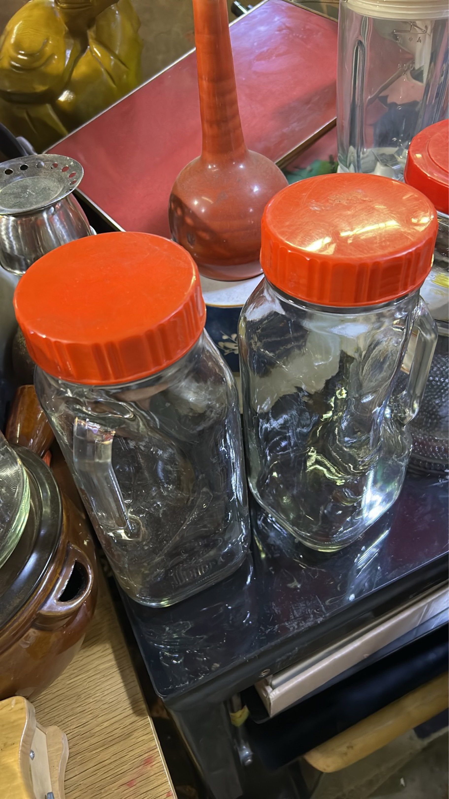 2 PC PAIR ELEGANT THICK GLASS JARS WITH GLASS SIDE HANDLE & LID (Category: Water Bottles & Tumblers) located in Valenzuela. Submitted by gregferraren (Listing ID 1421996901, Image 2). Description: 2 pcs Pair thick glass Unused like new P1380 Good for exquisite kitchen decor / snacks, nuts, chocolate munchies storage Good as water pitcher, juice, soda. Good as collectible item Sure buyer may inquire video/ charged real time delivery or shipping na