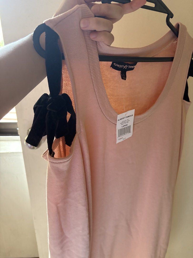 Almost Famous Cold Shoulder Dress - Large (Category: Longsleeves) located in Cainta. Submitted by kpc905 (Listing ID 1421976583, Image 2). Description: - Almost Famous cold shoulder dress - Soft pink color - Size: Large - Long sleeves - Black ribbon shoulder details - New with tags - Original price: $34.00 bought in US.