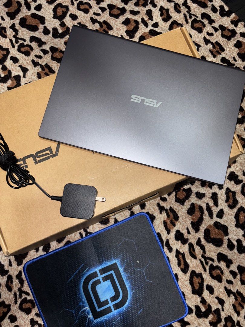 ASUS Vivobook X415DAP Laptop (Category: Laptops & Notebooks) located in Pasig City. Submitted by swapwithme (Listing ID 1422035139, Image 2). Description: - ASUS Vivobook X415DAP laptop - AMD Ryzen 3 3250U processor with Radeon Graphics - 8GB RAM - Includes charger and mousepad (freebie) - Comes with original box - Comes with original charger - Comes with original asus bag - Comes with mousepad - In good working condition.