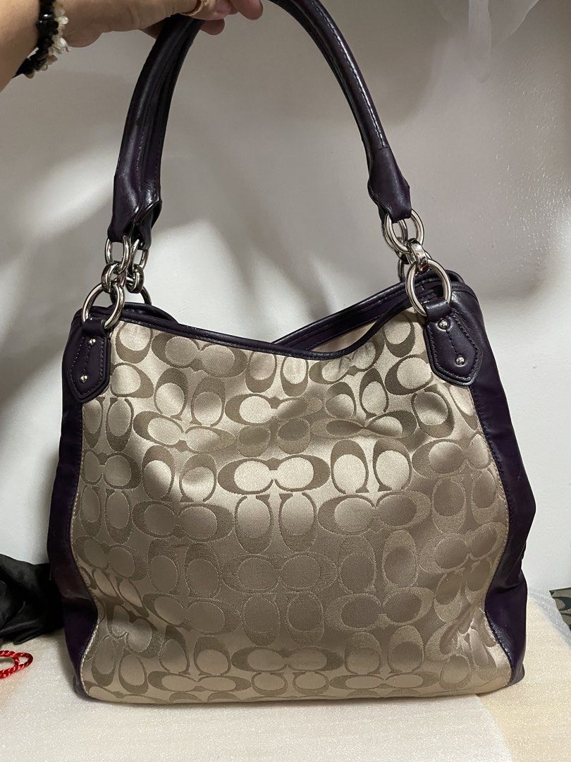 Authentic Coach Colette Signature C Hobo Bag (Category: Luxury Bags & Wallets) located in Guiguinto. Submitted by prelovedinc2024 (Listing ID 1421989185, Image 3). Description: guaranteed authentic, bought un Japan with signs of use - rubs, color transfers, dirt and scratches on leather part silver hardwares - with hairlines but no tarnish purple leather last photo is only for reference size: approx 13x12x3.5”.