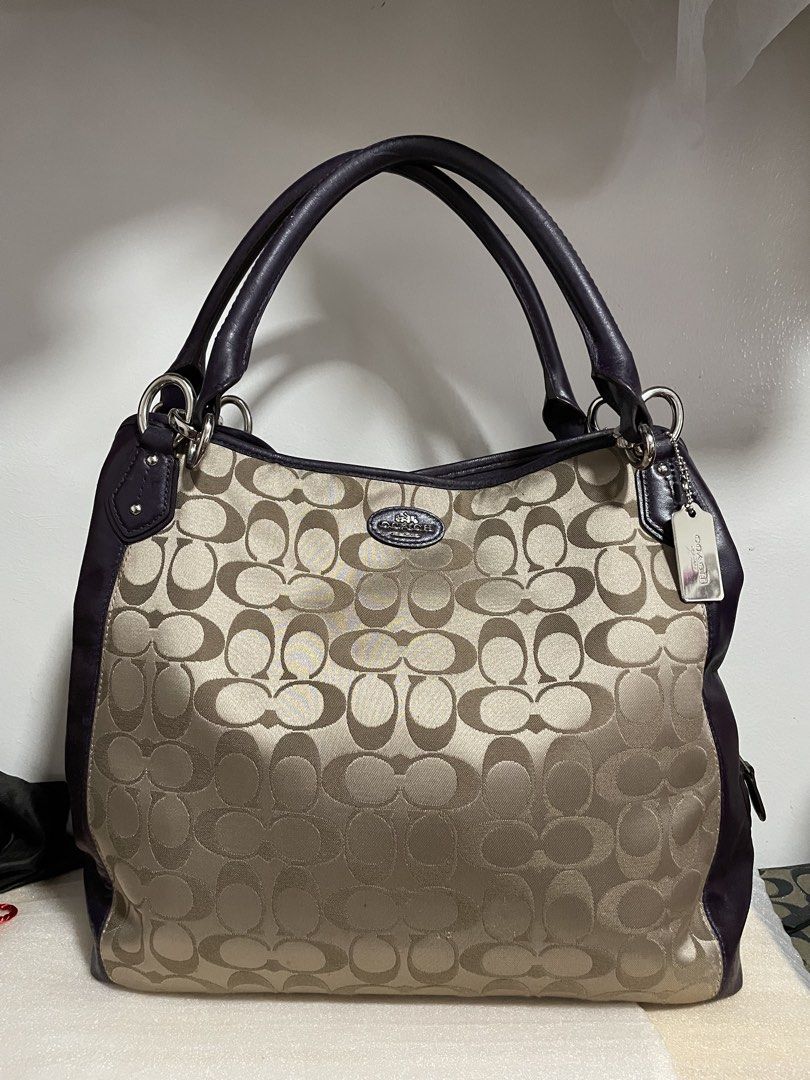 Authentic Coach Colette Signature C Hobo Bag (Category: Luxury Bags & Wallets) located in Guiguinto. Submitted by prelovedinc2024 (Listing ID 1421989185, Image 1). Description: guaranteed authentic, bought un Japan with signs of use - rubs, color transfers, dirt and scratches on leather part silver hardwares - with hairlines but no tarnish purple leather last photo is only for reference size: approx 13x12x3.5”.
