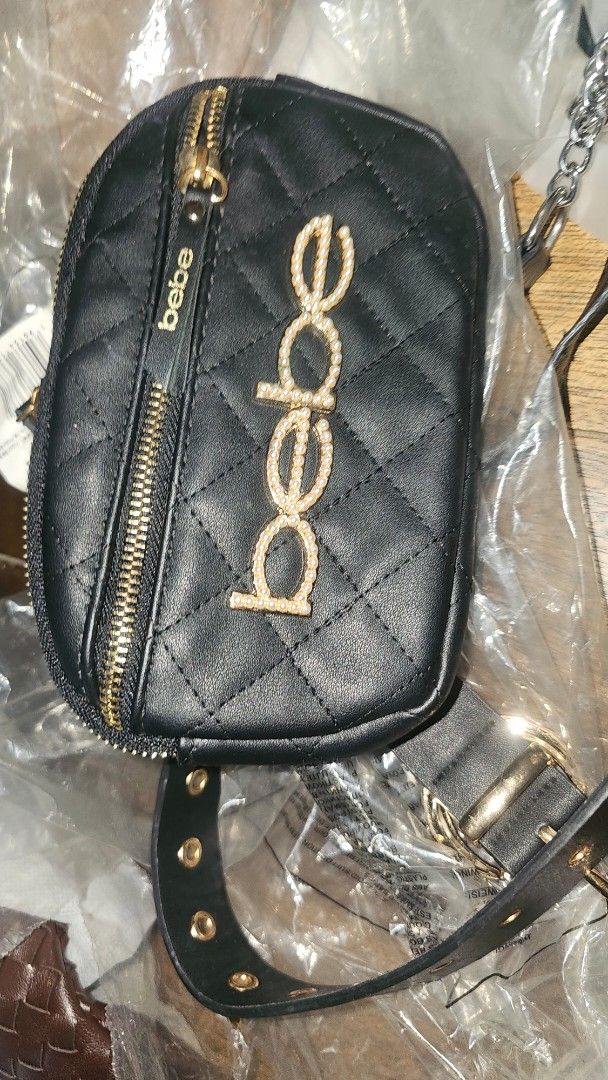 Bebe Quilted Belt Bag (Category: Cross-body Bags) located in Manila. Submitted by sereenity (Listing ID 1421955885, Image 1). Description: - Black Bebe belt bag - Quilted design - Gold zipper - Bebe logo on front - Includes black belt with gold eyelets - Features chain strap - Made in China.