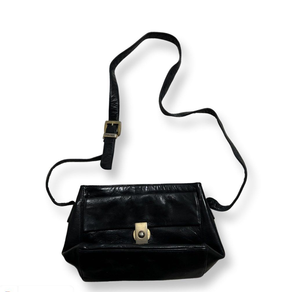 Black Leather Shoulder Bag (Category: Shoulder Bags) located in Makati City. Submitted by elideclutterss (Listing ID 1422026643, Image 1). Description: - Black leather shoulder bag - Flap closure - Adjustable strap - Gold-tone buckle - Rectangular shape - Front pocket.