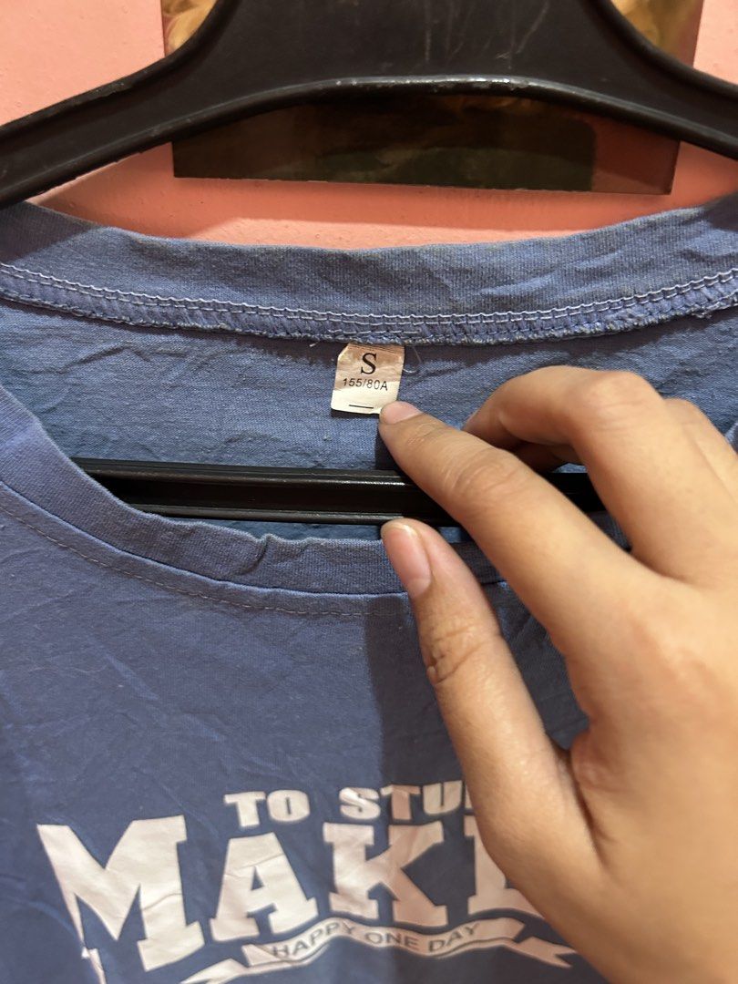 Blue Graphic T-shirt - Size S (Category: Tshirts & Polo Shirts ) located in Cainta. Submitted by hersheys17 (Listing ID 1422014278, Image 3). Description: - Blue t-shirt - Graphic print: "TO STUDY MAKES HAPPY ONE DAY" - Size: S - Features: Round neckline, short sleeves - Fabric: Lightweight.