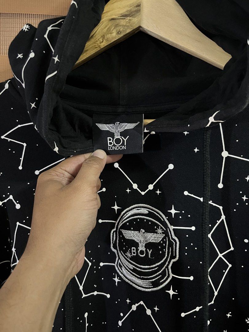 Boy London Astronaut Hoodie featuring a constellation pattern (Category: Hoodies) located in Paranaque City. Submitted by mondaysglory (Listing ID 1422067854, Image 2). Description: black Boy London Astronaut Hoodie featuring a constellation pattern and an eagle logo inside a helmet graphic L - 24.5 W - 23 Color rate: 9.5/10 Condition: Very Good No issue - Black Boy London hoodie - Size: S - Design: Constellation - Features: Astronaut helmet grap
