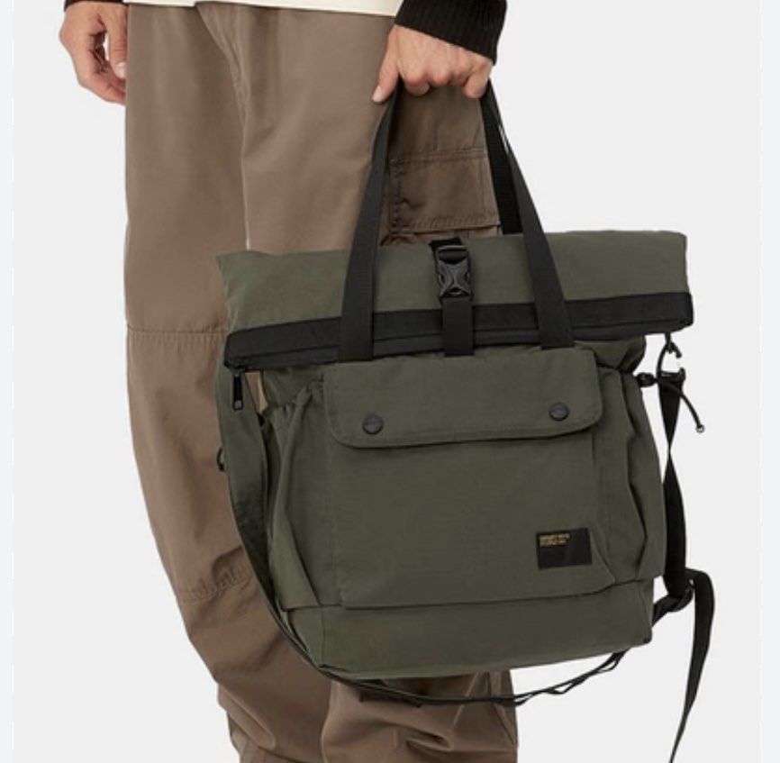Carhartt Utility Tote Bag (Category: Sling Bags) located in Manila. Submitted by raffcol (Listing ID 1422002484, Image 1). Description: - Carhartt olive green tote bag - bought at Carhartt, Power Plant Mall - Roll-top closure - Front pocket - Secure buckle closure - Perfect for everyday use - negotiable.