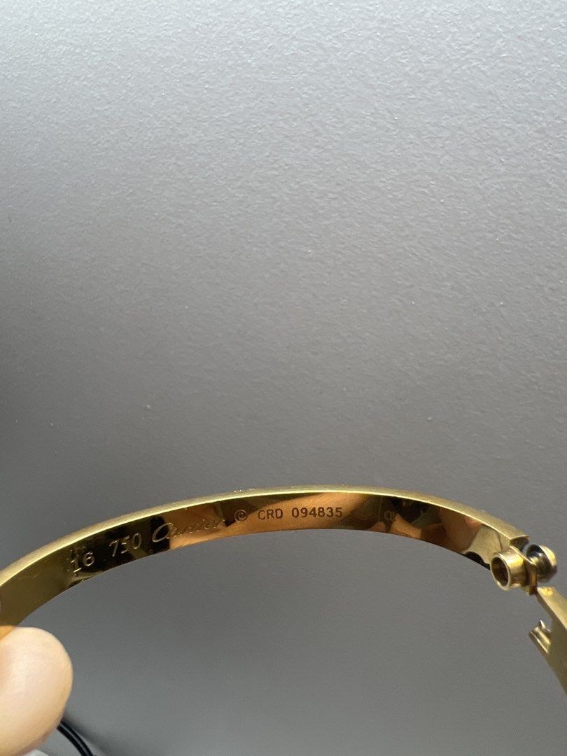 Cartier Love Bracelet 16 (Category: Bracelets) located in Manila. Submitted by bluearrow14 (Listing ID 1422053526, Image 2). Description: - Cartier Love Bracelet - Iconic screw design - Size 16 - Includes screwdriver - Marked: "750 Cartier" and serial number CRD 094835 Minimal scratches.