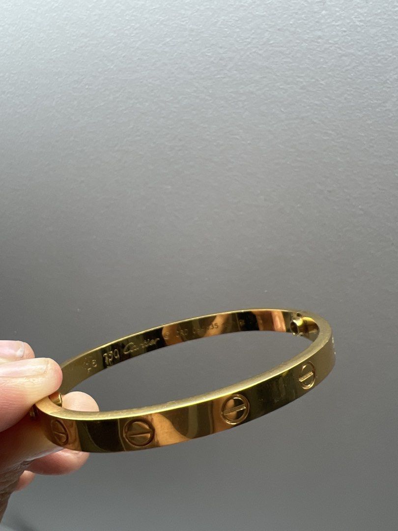 Cartier Love Bracelet 16 (Category: Bracelets) located in Manila. Submitted by bluearrow14 (Listing ID 1422053526, Image 1). Description: - Cartier Love Bracelet - Iconic screw design - Size 16 - Includes screwdriver - Marked: "750 Cartier" and serial number CRD 094835 Minimal scratches.