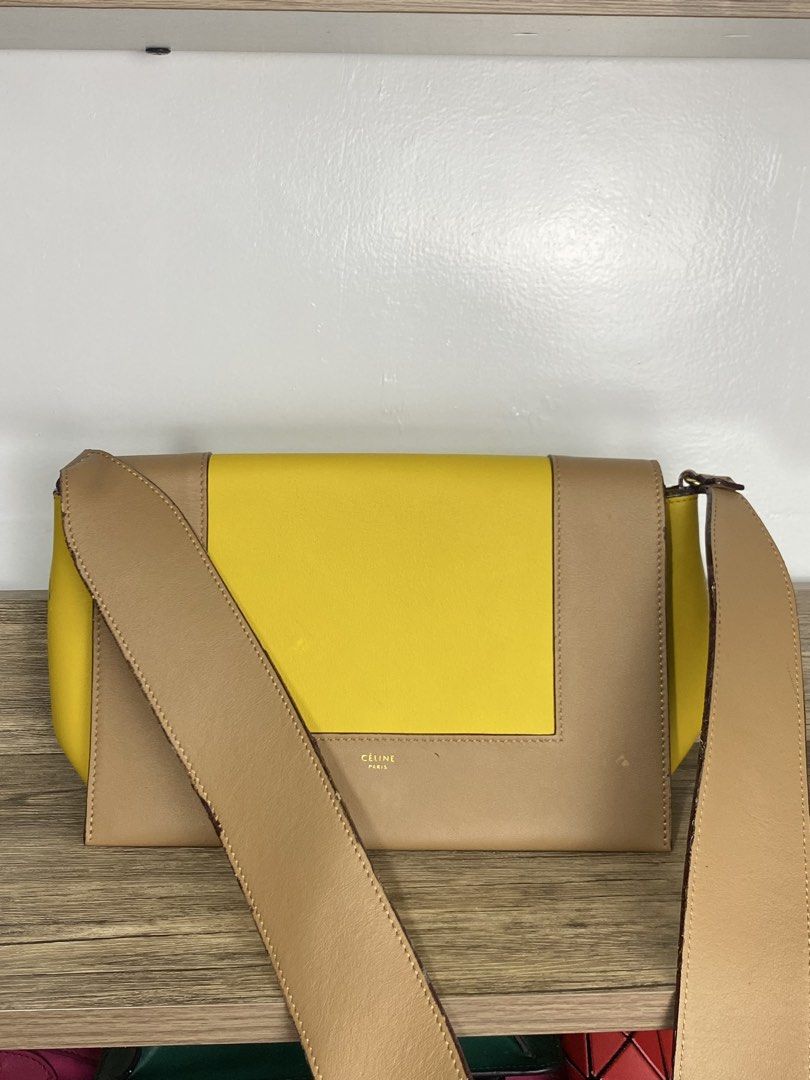 Celine Medium Frame Shoulder Bag (Category: Luxury Bags & Wallets) located in Tacloban City. Submitted by houseofluxury.co (Listing ID 1422081248, Image 2). Description: Celine Medium Frame Shoulder Bag crafted from calfskin leather in Yellow an Tan colorway. Guaranteed Authentic 💯 Visible signs of use and melted rubber lining flaw. Dustbag inclusion.