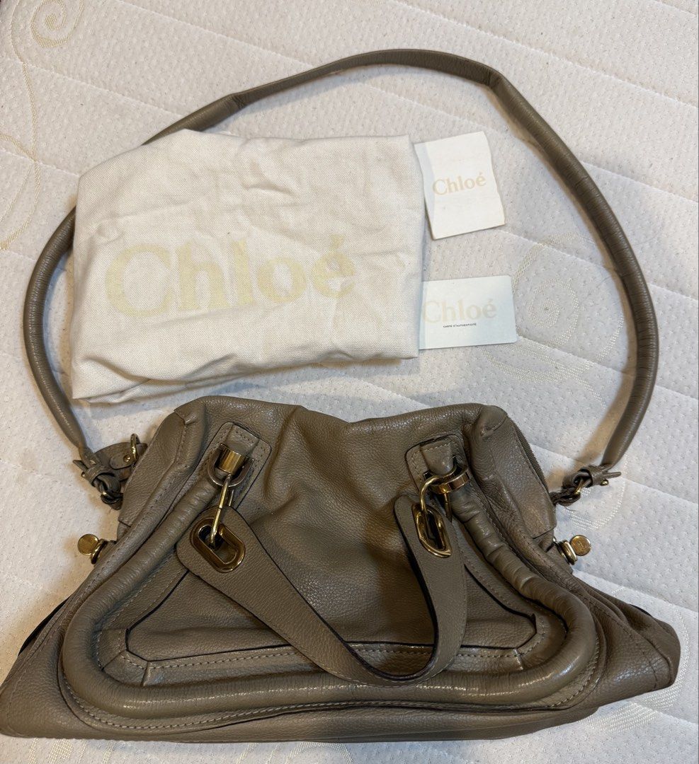 Chloe Paraty bag (Category: Luxury Bags & Wallets) located in Manila. Submitted by pam.pam4 (Listing ID 1421967685, Image 1). Description: - Authentic Chloe Paraty handbag - taupe color - Includes dust bag and tags - Top handle - Gold-tone hardware - Made of leather - Classic and stylish design Condition used.