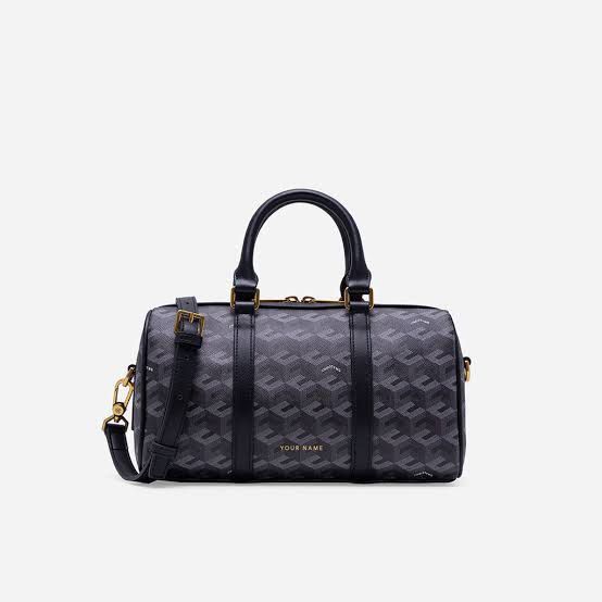 Christy Ng Enzo Mini Duffle Bag - Black (Category: Cross-body Bags) located in Quezon City. Submitted by cleanspaceph (Listing ID 1421981863, Image 2). Description: - Christy Ng Enzo Mini Duffle Bag - Black and grey geometric pattern - Top handle and detachable shoulder strap - Zip closure with gold-tone hardware - Small size - Includes dust bag and tags.