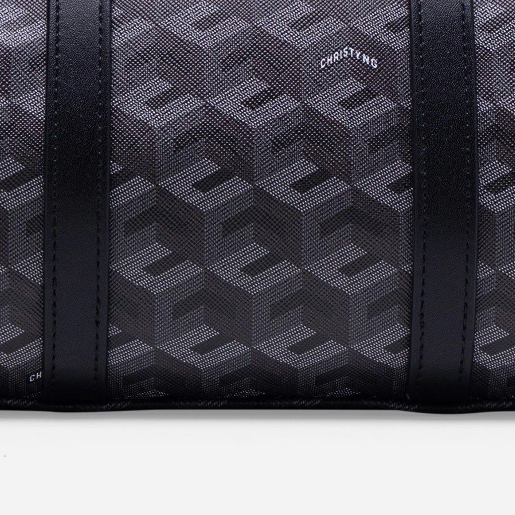 Christy Ng Enzo Mini Duffle Bag - Black (Category: Cross-body Bags) located in Quezon City. Submitted by cleanspaceph (Listing ID 1421981863, Image 3). Description: - Christy Ng Enzo Mini Duffle Bag - Black and grey geometric pattern - Top handle and detachable shoulder strap - Zip closure with gold-tone hardware - Small size - Includes dust bag and tags.
