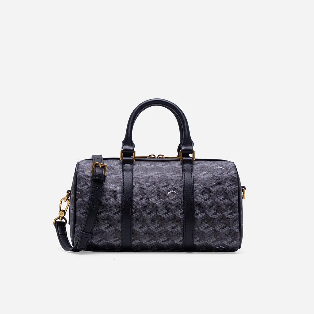 Christy Ng Enzo Mini Duffle Bag - Black (Category: Cross-body Bags) located in Quezon City. Submitted by cleanspaceph (Listing ID 1421981863, Image 1). Description: - Christy Ng Enzo Mini Duffle Bag - Black and grey geometric pattern - Top handle and detachable shoulder strap - Zip closure with gold-tone hardware - Small size - Includes dust bag and tags.