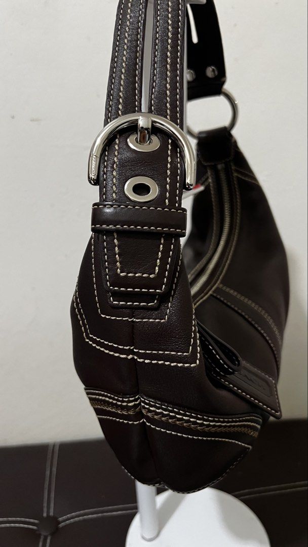 Coach Soho Hobo bag (Open for LAYAWAY) (Category: Luxury Bags & Wallets) located in Bulacan. Submitted by rds.declutter (Listing ID 1421962217, Image 2). Description: - Authentic Coach handbag - Coach Brown Leather Hobo Bag - Interior Coach label with serial number A0769-10574 - Spacious interior Makinis na malinis pa labas at loob, sobrang cute and ganda. Masarap i-touch kasi original leather. Pwedeng pwede sa maselan at maarte, no flaws..
