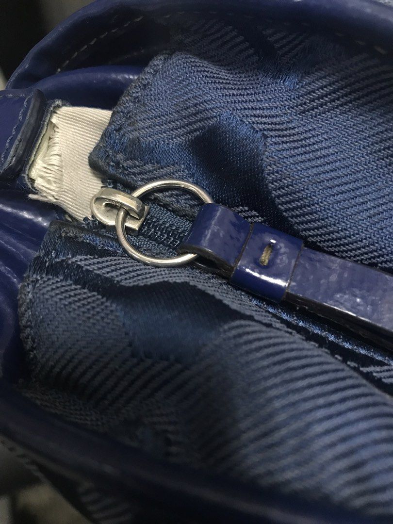 COACH Two-Way Bag (Authentic) (Category: Luxury Bags & Wallets) located in Quezon City. Submitted by juanna. (Listing ID 1421306618, Image 3). Description: ✅ Authentic COACH two-way bag ✅Navy blue color ✅Can be worn as crossbody or carried by handles ✅Classic COACH design ✅Washable canvass material ✅With minor flaw (last photo).