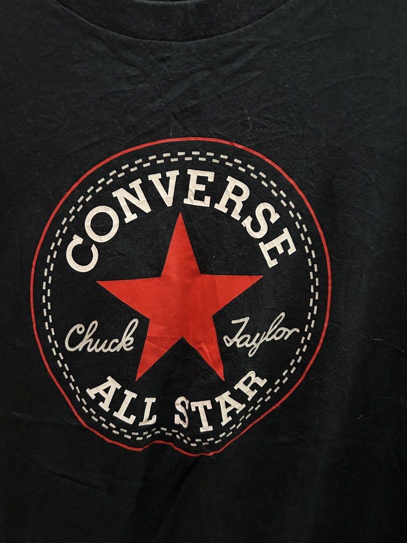 Converse Chuck Taylor All Star T-shirt (Category: Shirts) located in Cainta. Submitted by hersheys17 (Listing ID 1422013717, Image 2). Description: - Classic black Converse t-shirt - Features the iconic Converse logo - Comfortable fabric - Perfect for casual wear - A timeless wardrobe staple.
