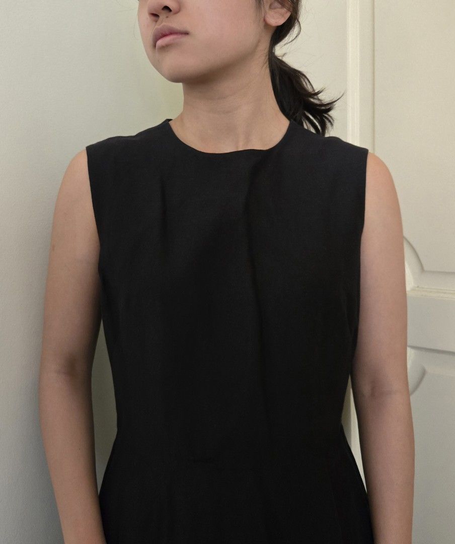 COS Black Sleeveless Dress (Category: Dresses) located in Mandaluyong City. Submitted by helloshopgirl (Listing ID 1422009698, Image 3). Description: Black sleeveless dress from COS. Features a round neckline and a unique bubble hem. The dress is made in Turkey. Size is EUR 36 / CN 165/84A. There is a small seaming on the front of the dress. The dress has a fitted bodice and a flared skirt. Dress is worn but well kept. RFS: doesn't fit me anymore