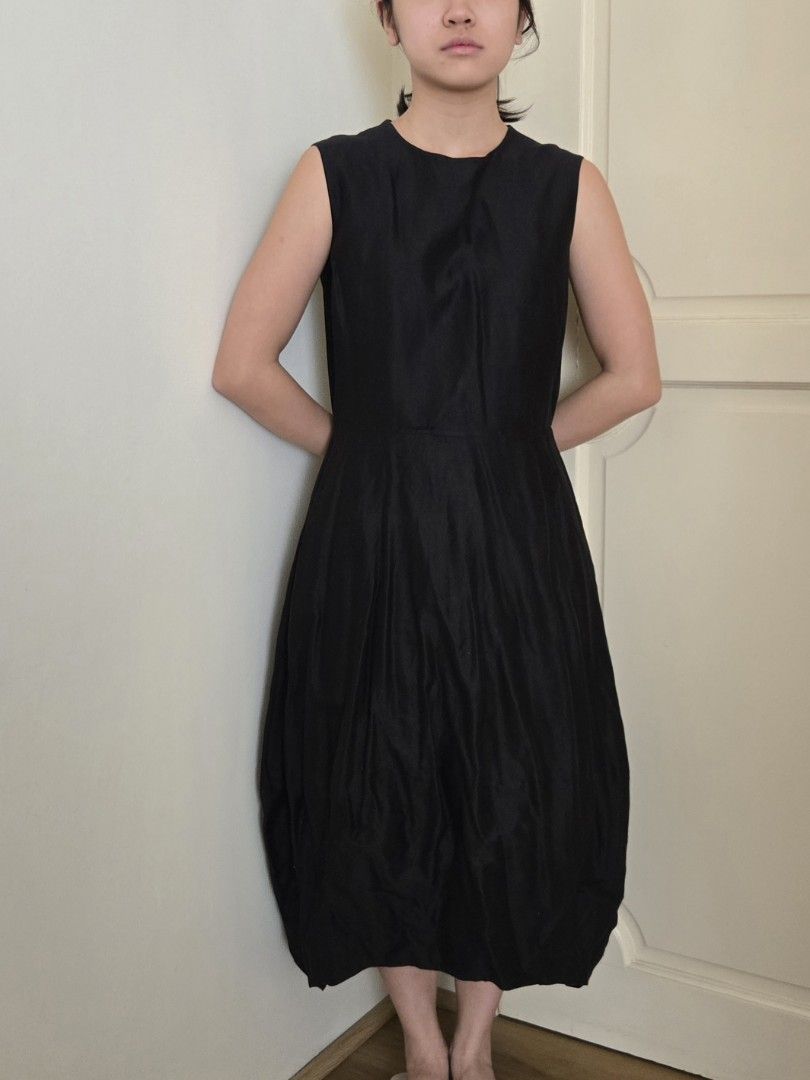 COS Black Sleeveless Dress (Category: Dresses) located in Mandaluyong City. Submitted by helloshopgirl (Listing ID 1422009698, Image 1). Description: Black sleeveless dress from COS. Features a round neckline and a unique bubble hem. The dress is made in Turkey. Size is EUR 36 / CN 165/84A. There is a small seaming on the front of the dress. The dress has a fitted bodice and a flared skirt. Dress is worn but well kept. RFS: doesn't fit me anymore