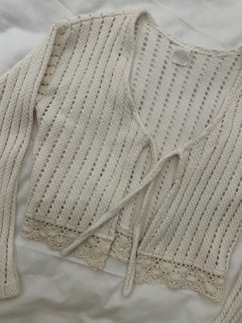 Cream Crochet Cardigan (Category: Coats, Jackets and Outerwear) located in Pasig City. Submitted by gdeclutterwithme (Listing ID 1422059062, Image 2). Description: - Cream crochet cardigan - Literally perfect for layering! my fav for wearing on top of my tube tops hihi - very nice texture huhu - Size fits from XS-S - No brand as I bought this in america - 15.3 x 15.5 dm for more details!!.