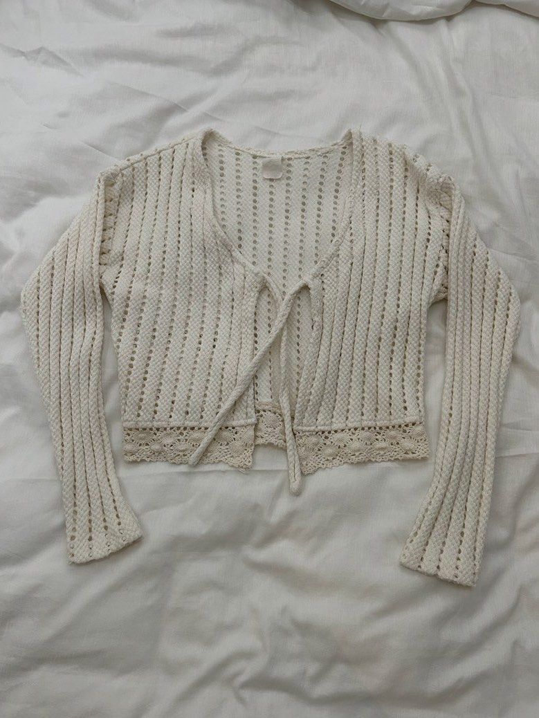 Cream Crochet Cardigan (Category: Coats, Jackets and Outerwear) located in Pasig City. Submitted by gdeclutterwithme (Listing ID 1422059062, Image 1). Description: - Cream crochet cardigan - Literally perfect for layering! my fav for wearing on top of my tube tops hihi - very nice texture huhu - Size fits from XS-S - No brand as I bought this in america - 15.3 x 15.5 dm for more details!!.