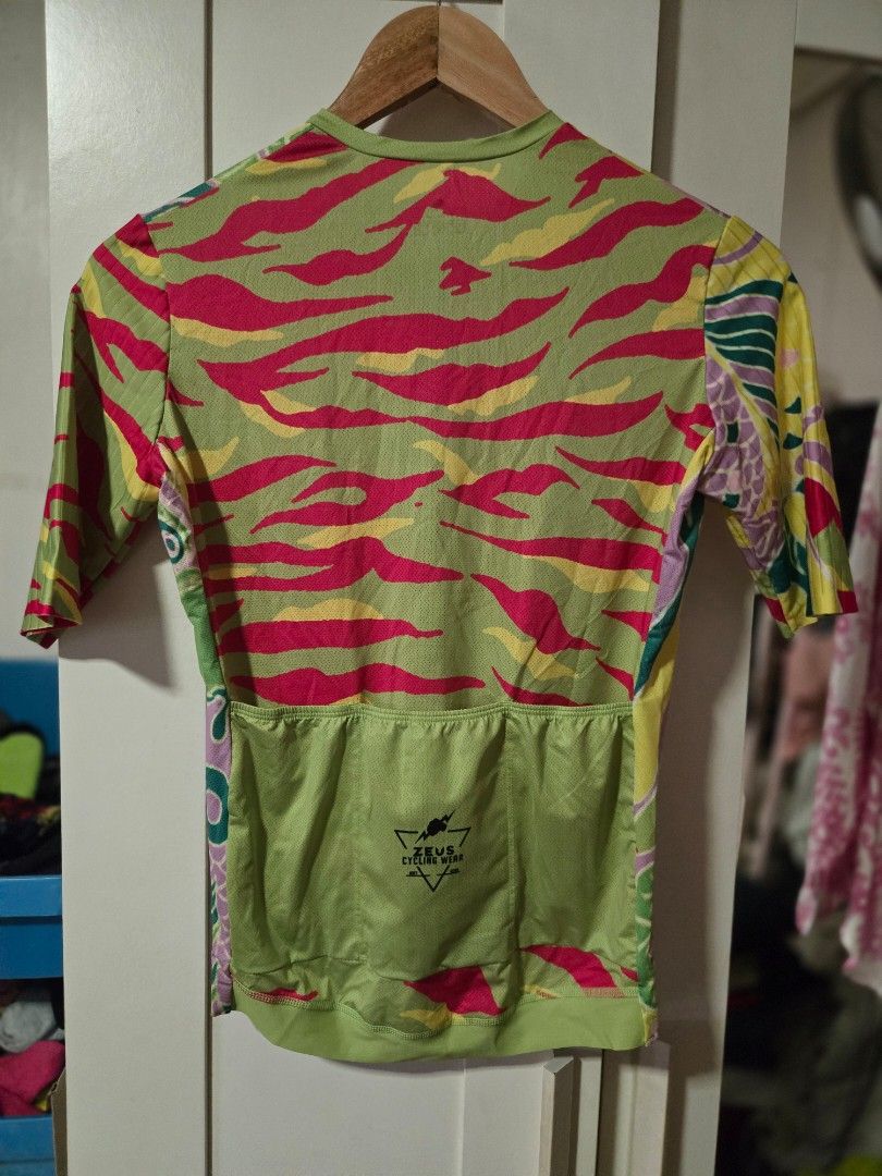 Cycling Jersey with Colorful Pattern (Category: Activewear) located in Quezon City. Submitted by ddlry (Listing ID 1422005074, Image 2). Description: - Vibrant cycling jersey - Unique, colorful design - Full-length zipper - Long sleeves - Lightweight material - Convenient back pockets - Features a chest logo.