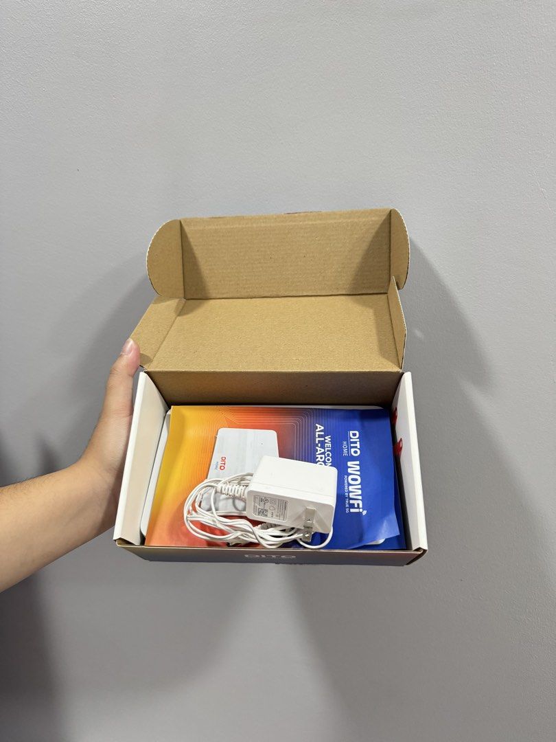 DITO Home WowFi Router (Category: Networking) located in Bacoor. Submitted by jungcartz02 (Listing ID 1421974436, Image 3). Description: - RFS: Mahina signal ng DITO sa location ko - DITO Home WowFi Router - Up to 100 Mbps speed - Unlimited 5G data - Powered by True 5G - Includes: Router, Power Adapter, Welcome Guide - White router with DITO Home logo - MU: University Belt, UST Dapitan, SBU Mendiola.