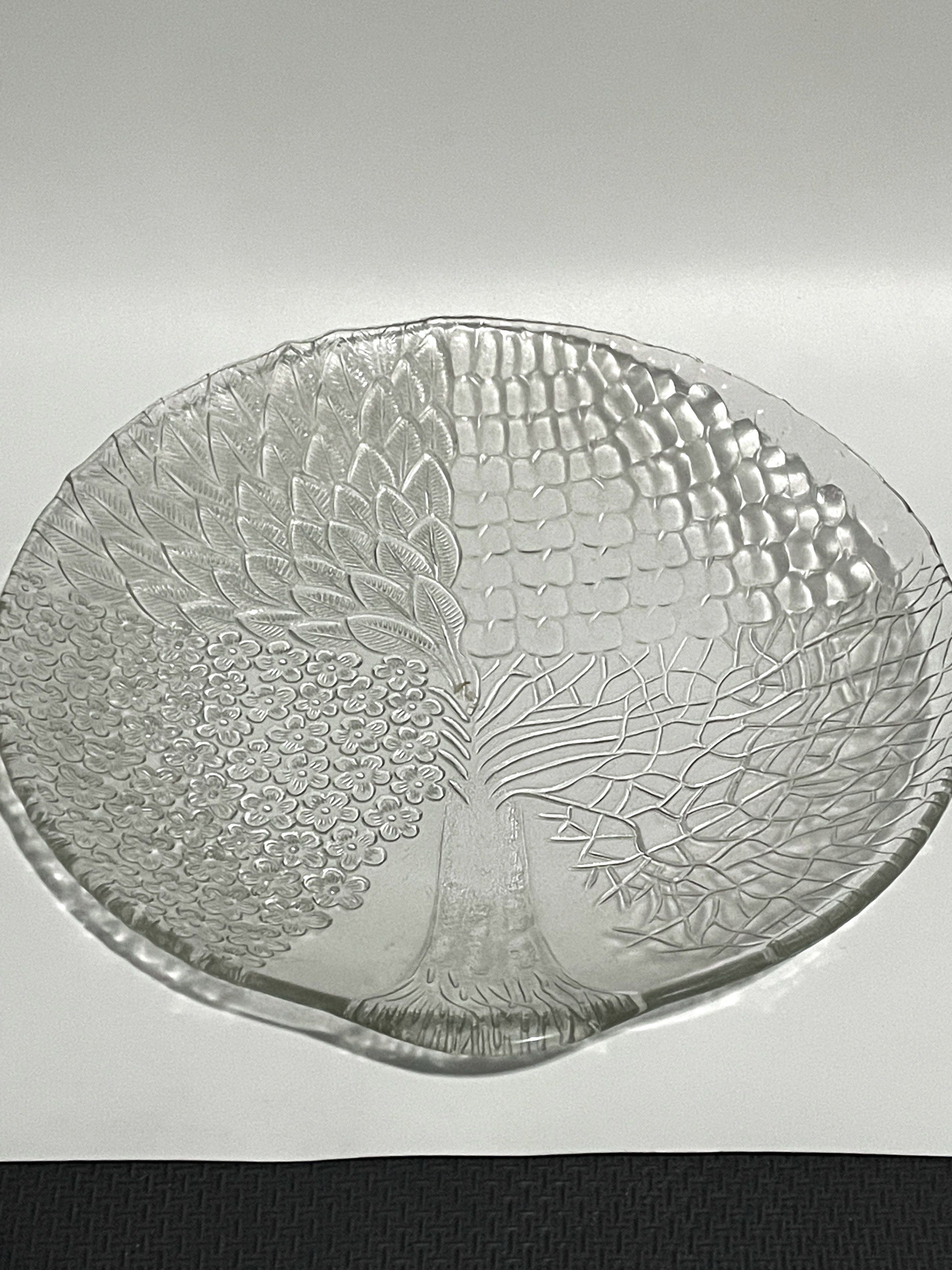 Dynasty Glass Serving Plate (Category: Dinnerware & Cutlery) located in Bacoor. Submitted by milesgm (Listing ID 1422023015, Image 3). Description: - 1pc glass serving plate - Unique tree design - Textured surface - Approx 12” - Unused and in original box.