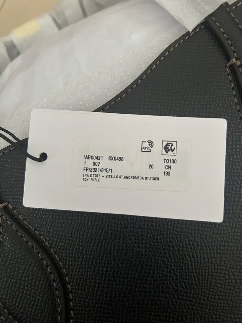 Furla Era S Tote Bag (Category: Luxury Bags & Wallets) located in Pasig City. Submitted by jrrhs (Listing ID 1421995605, Image 3). Description: - Furla Era S Tote Bag - Brand new with tags - Unique tiger stripe design - Includes a tiger charm - Perfect size for everyday use - Authentic Furla quality - Comes with dust bag.