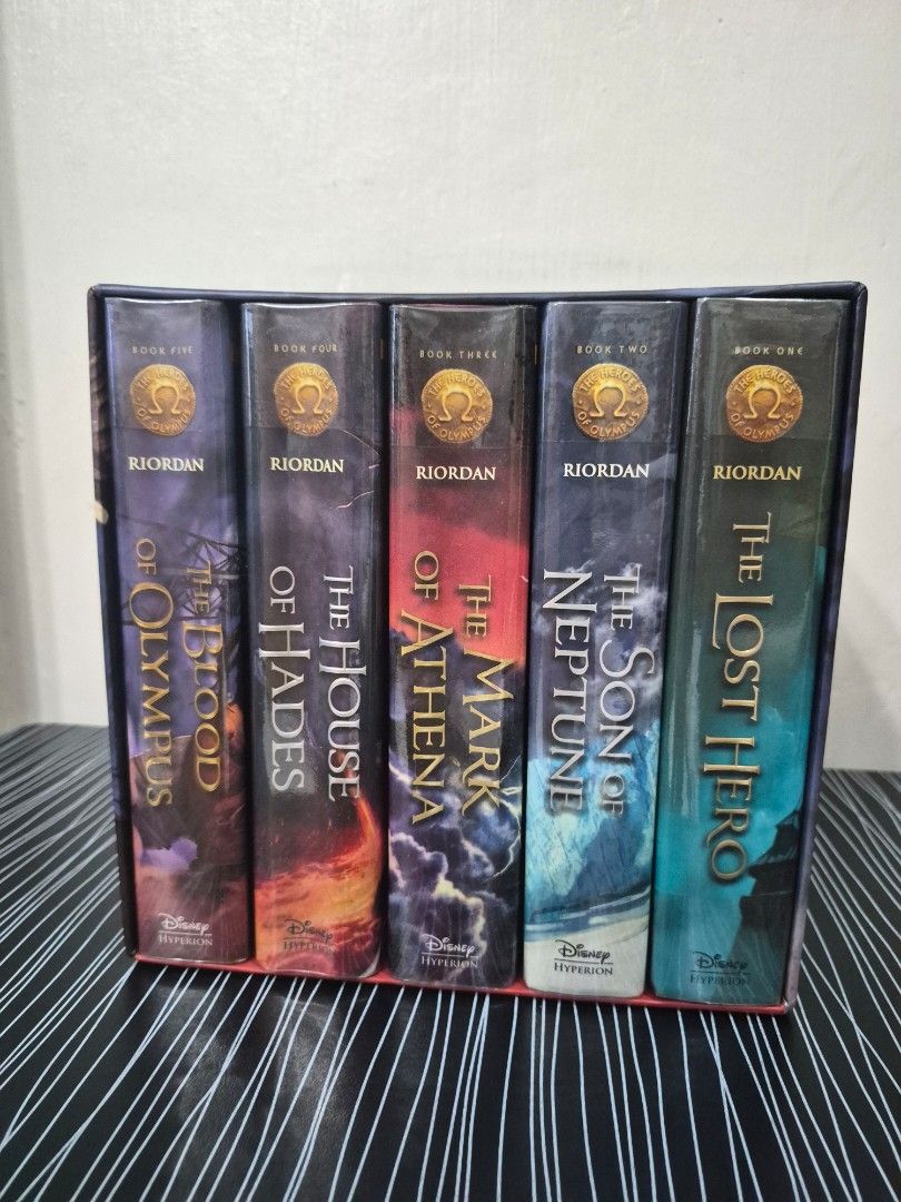 Heroes of Olympus Hardbound Boxset (Category: Storybooks) located in Cainta. Submitted by gerlaystreasures (Listing ID 1422080611, Image 1). Description: Horoes Of Olympus Hardbound boxset With dust Jacket Very well stored and kept RFS: Fund sourcing and to free-up space - Complete Heroes of Olympus box set - Includes all 5 books: - "The Lost Hero" - "The Son of Neptune" - "The Mark of Athena" - "The House of Hades" - "The Blood of Olympus" - By 