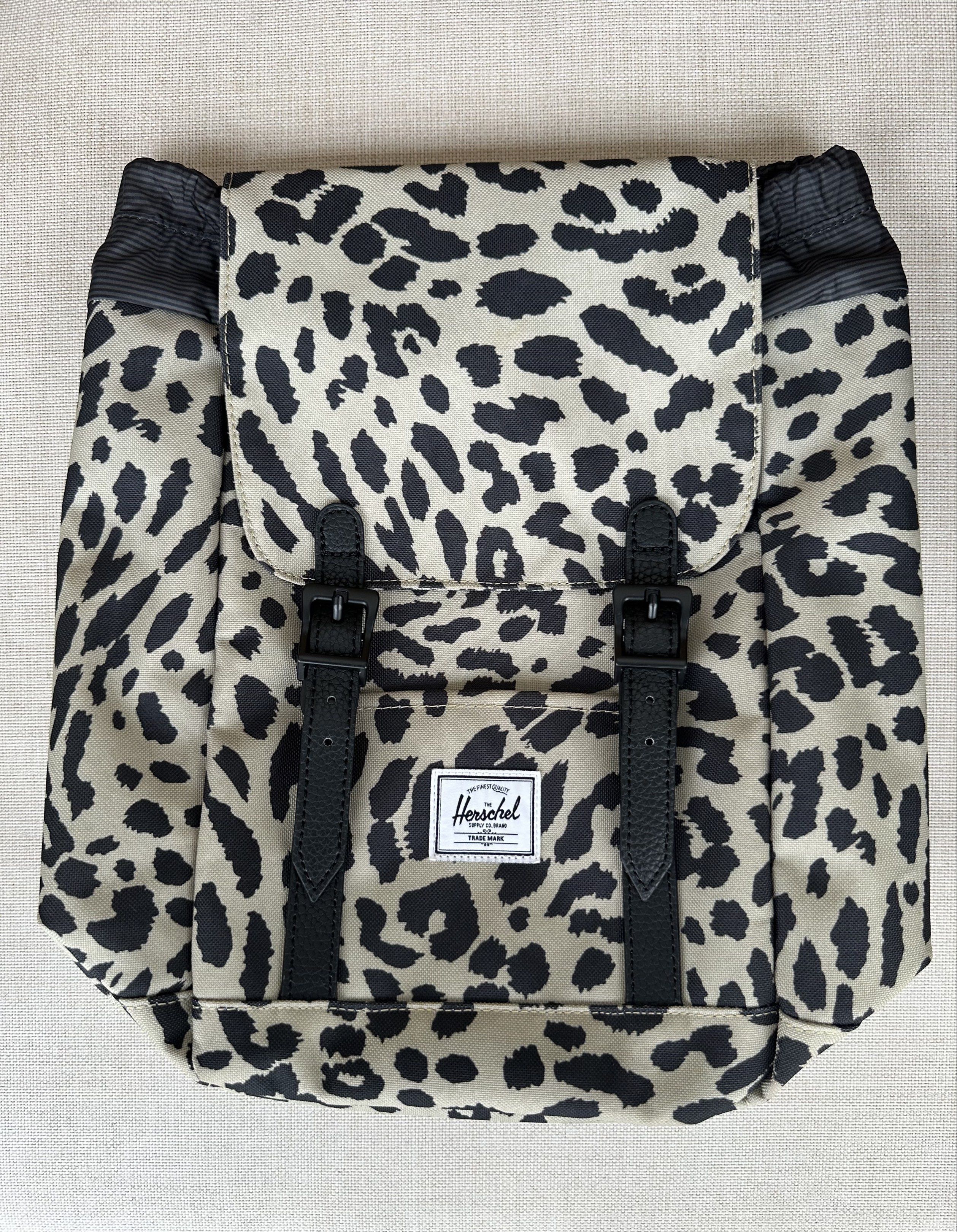 Herschel Supply Co. Leopard Print Backpack (Category: Backpacks) located in Paranaque City. Submitted by seektoshop (Listing ID 1422020958, Image 1). Description: Take a quick Retreat. Sized to carry just what you need and made from 100% recycled EcoSystem fabrics our smallest Retreat Backpack keeps essentials with you when you’re on the go. Dimensions: 11.5” (H) x 9” (W) X 5” (D) -EcoSystem 600D Fabric made from 100% recycled post consumer water