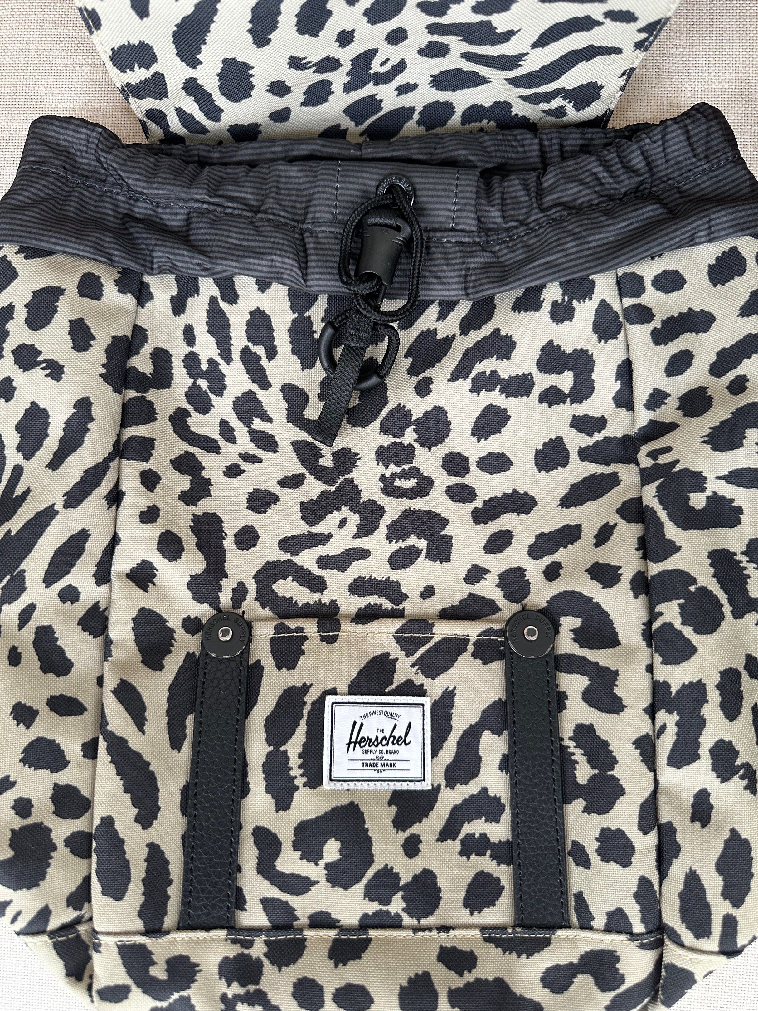 Herschel Supply Co. Leopard Print Backpack (Category: Backpacks) located in Paranaque City. Submitted by seektoshop (Listing ID 1422020958, Image 2). Description: Take a quick Retreat. Sized to carry just what you need and made from 100% recycled EcoSystem fabrics our smallest Retreat Backpack keeps essentials with you when you’re on the go. Dimensions: 11.5” (H) x 9” (W) X 5” (D) -EcoSystem 600D Fabric made from 100% recycled post consumer water