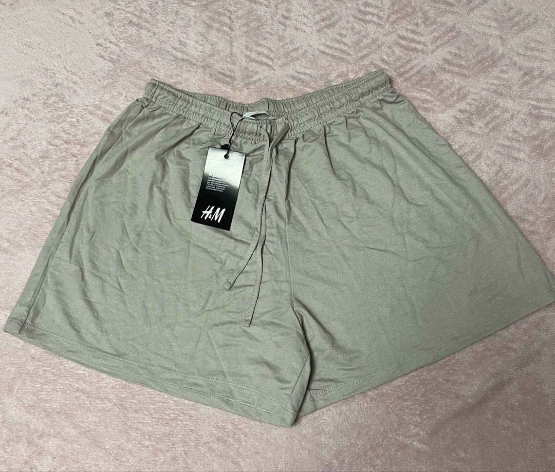 H&M Drawstring Shorts (Category: Shorts) located in Paranaque City. Submitted by princessann0721 (Listing ID 1422058494, Image 1). Description: - H&M shorts - Neutral color - Drawstring waist - Relaxed fit - Brand new with tag - Perfect for casual outfits.