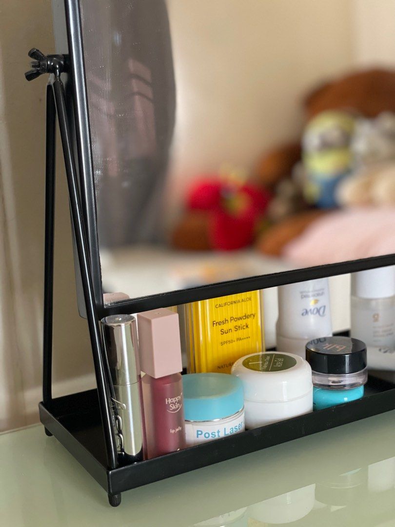 IKEA Table Mirror (Category: Mirrors) located in Manila. Submitted by declutteredbyalex (Listing ID 1421986731, Image 3). Description: - Has compartment to put your skincare creams - The mirror tilt is adjustable on the side - Not dumihin and matibay! - Perfect for doing make up and skin care routines Height/length 14 inches Width almost 10 inches RFS: Bought a new mirror IKEA name: IKEA Karmsund Table Mirror (Black).