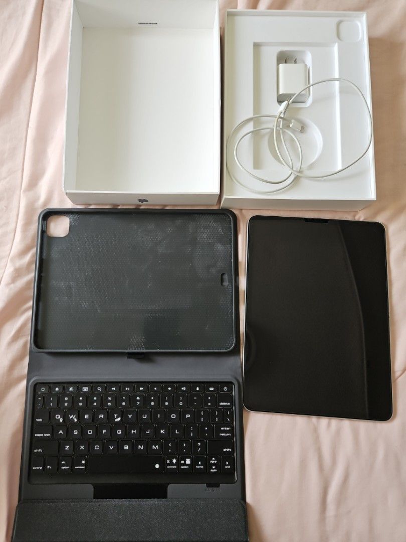 iPad Pro 11 inch 3rd Gen 128GB Wifi (Category: iPad) located in Marikina City. Submitted by chitricalde (Listing ID 1421970080, Image 1). Description: iPad Pro 11 inch 128GB Wifi works well. Barely used. The side has dent but no issues on camera, sounds, controls, screen. Comes with screen protector, case with keyboard, C - C charging cable, charger and original box..