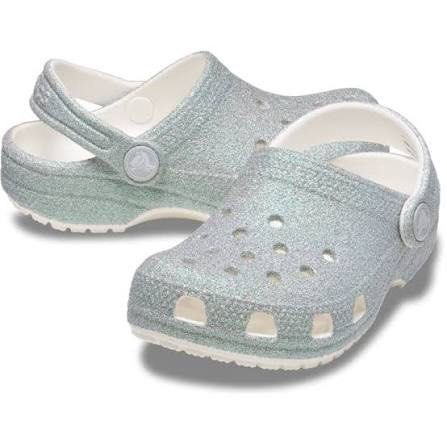 Crocs Kids' Classic Iridescent Glitter Clog (Category: Babies & Kids Fashion) located in Quezon City. Submitted by declutterr (Listing ID 1422000607, Image 1). Description: Hey there, looking for some sparkly shoes for your little one? Check out these Kids' Classic Iridescent Glitter Crocs! These are the classic Crocs design, so you know they're comfy and have those handy ventilation holes. Plus, they have a pivoting heel strap for a secure fit. 