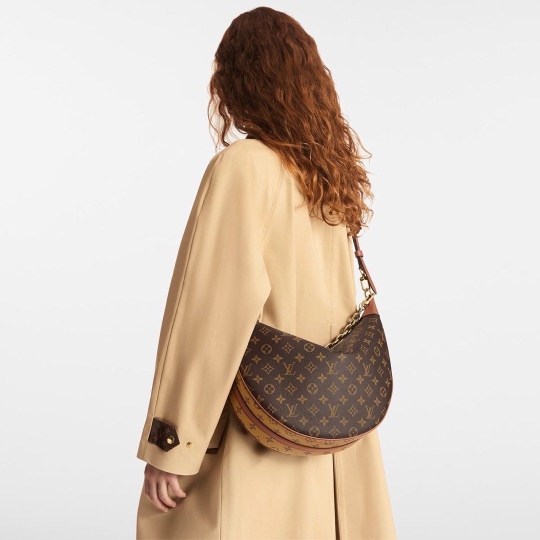 Louis Vuitton Crescent Hobo Bag (Category: Luxury Bags & Wallets) located in Taguig. Submitted by norie.m (Listing ID 1421989452, Image 2). Description: - Crescent Hobo Bag - Iconic Monogram canvas - Stylish crescent shape - Gold-color chain - Removable leather strap (shoulder/crossbody) - Secure zip closure - Textile lining - Perfect for everyday wear.