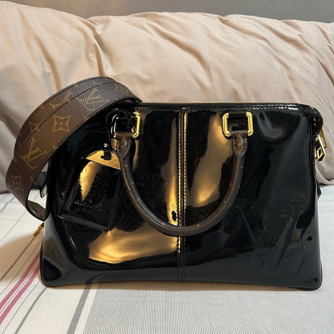 Louis Vuitton Miroir Handbag Vernis with Monogram Canvas (Category: Luxury Bags & Wallets) located in Muntinlupa City. Submitted by tsl0303 (Listing ID 1422075737, Image 3). Description: Louis Vuitton Miroir Handbag Vernis with Monogram Canvas - Black vernis leather - Top handle and detachable shoulder strap - LV monogram detail - Gold-tone hardware - Zipper closure - Includes luggage tag -Microchip -Neat inside out 👜 Rank A 👜 Dimensions: 8.75H
