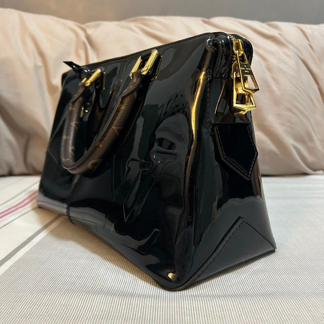 Louis Vuitton Miroir Handbag Vernis with Monogram Canvas (Category: Luxury Bags & Wallets) located in Muntinlupa City. Submitted by tsl0303 (Listing ID 1422075737, Image 2). Description: Louis Vuitton Miroir Handbag Vernis with Monogram Canvas - Black vernis leather - Top handle and detachable shoulder strap - LV monogram detail - Gold-tone hardware - Zipper closure - Includes luggage tag -Microchip -Neat inside out 👜 Rank A 👜 Dimensions: 8.75H