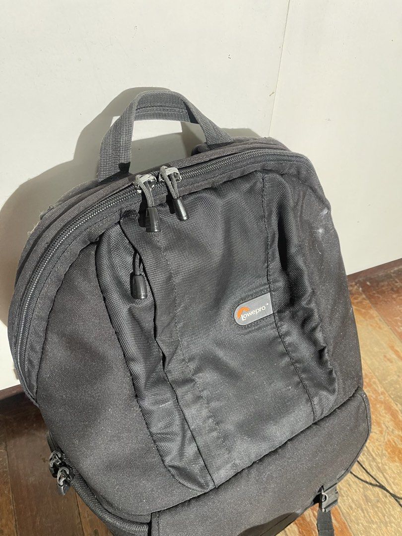 Lowepro Camera Backpack (Category: Camera Bags & Carriers) located in Quezon City. Submitted by kaizer_andre_0888 (Listing ID 1421995905, Image 2). Description: Lowerpro Backpack Used Has many Compartments Zippers no issues Some velcro needs restitching P3,000 Rfs: Upgrade Qc Balintawak.