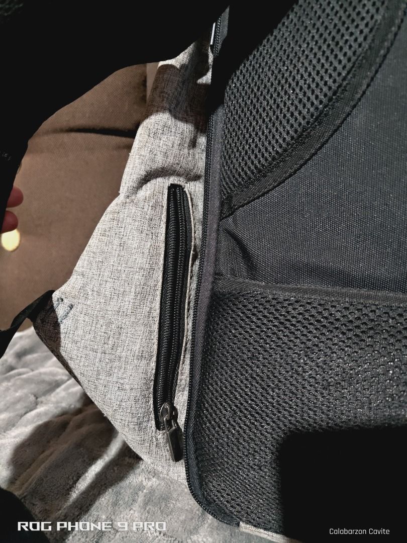 Mark Ryden Anti Theft Backpack (Category: Backpacks) located in General Mariano Alvarez. Submitted by tyronereygalang (Listing ID 1422009759, Image 3). Description: - Mark Ryden Anti-Theft Backpack - Stylish gray and black design - Multiple compartments for organized storage - Dedicated laptop section - Made of durable material - Convenient side zipper pocket - Comfortable padded shoulder straps.