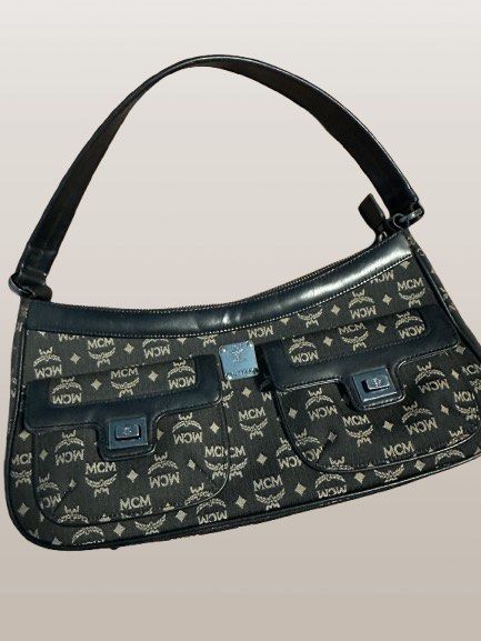 MCM Baguette Vintage Bag (Category: Luxury Bags & Wallets) located in San Fernando. Submitted by iaaasells (Listing ID 1422012567, Image 1). Description: Selling my MCM baguette vintage bag. In good vintage condition. May normal signs of use due to age but no major damage. Zippers and straps are still functional. Compact but kasya essentials like phone, wallet, keys, and lippie. RFS: Decluttering / not being used anymore. 📍Pampanga.