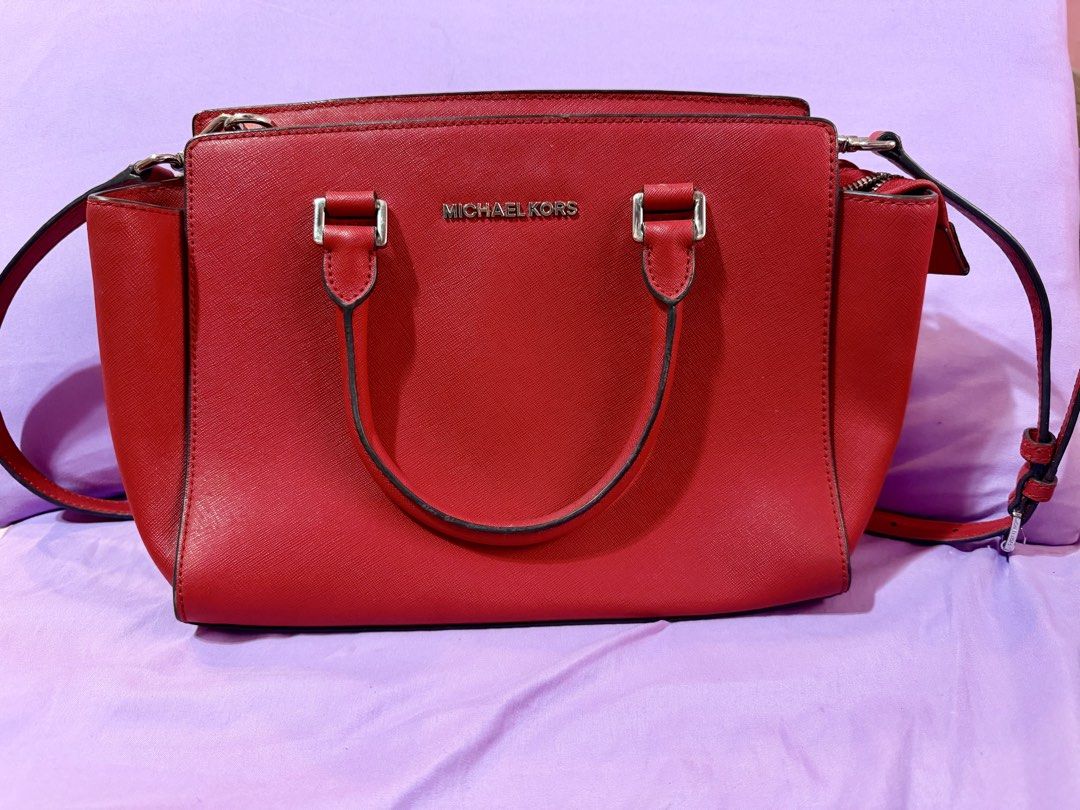Michael Kors Red Satchel Bag (Category: Luxury Bags & Wallets) located in Las Pinas. Submitted by mjm21 (Listing ID 1421946626, Image 1). Description: Original Michael Kors Selma Saffiano Red Bag Medium Bag Like brand new. Used twice only. .