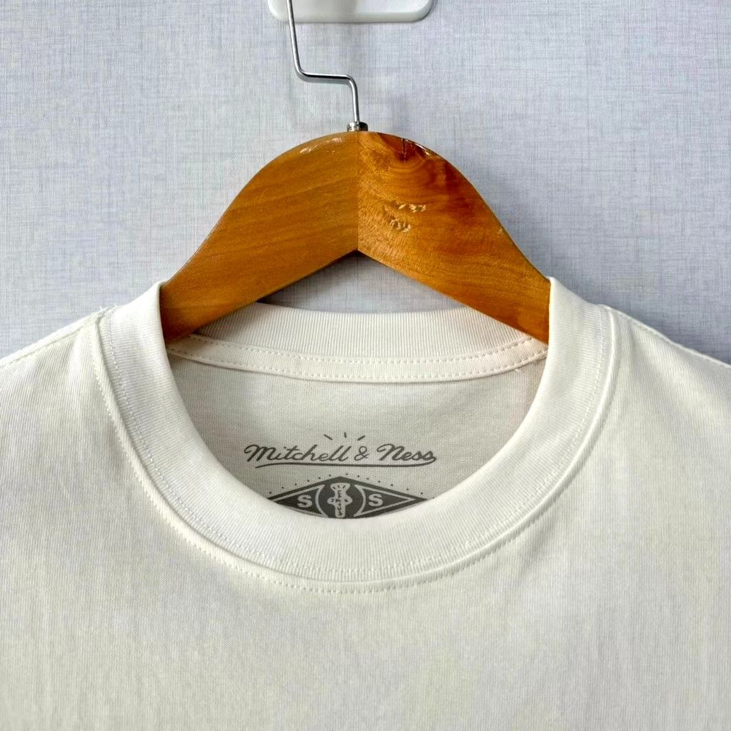 Mitchell & Ness Texas Longhorns T-shirt (Category: Tshirts & Polo Shirts ) located in Makati City. Submitted by stryan (Listing ID 1421983551, Image 3). Description: Official Texas Longhorns collaboration with Travis Scott and Mitchell & Ness. - Features the iconic Texas Longhorns logo. - Includes a small Cactus Jack logo on the sleeve. - Made from a comfortable 50/50 cotton/polyester blend. Condition: 10/10 fitting: small to medium.