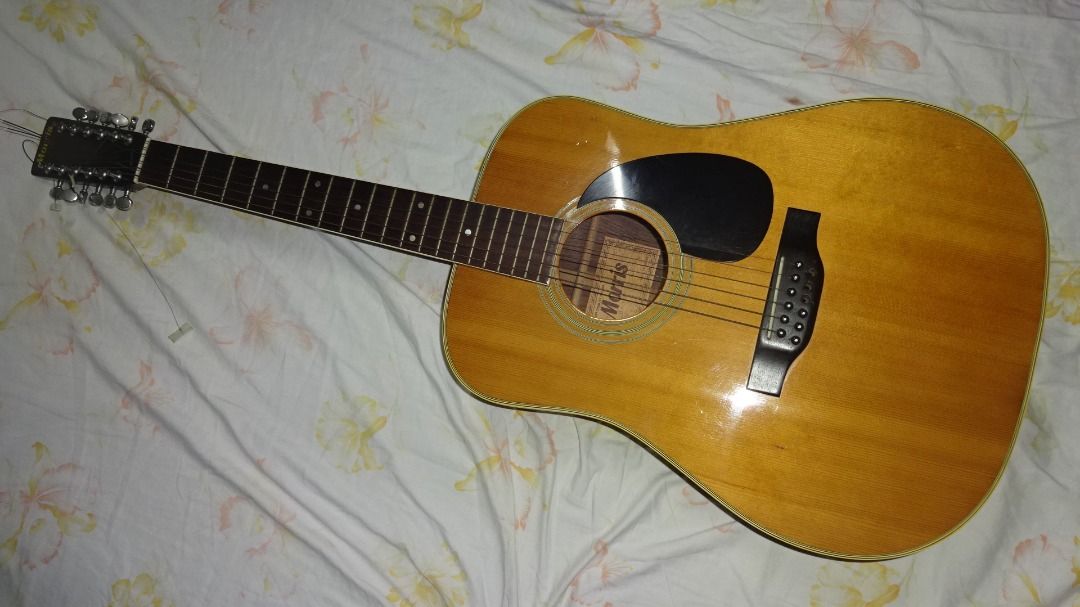 Morris Model B-30 12-string Dreadnought acoustic guitar (Category: Musical Instruments) located in Paranaque City. Submitted by kutoi.ancheta (Listing ID 1422068787, Image 1). Description: Morris, Model B-30 12-string Dreadnought acoustic guitar Brand,Morris Model,B-30 (12-String) Serial Number,40514 Year of Manufacture,Circa 1974–1977 Body Style,Dreadnought Top Wood,Solid Sitka Spruce Back/Sides Woods,Indian Rosewood (Laminate) Fingerboard/Bridg