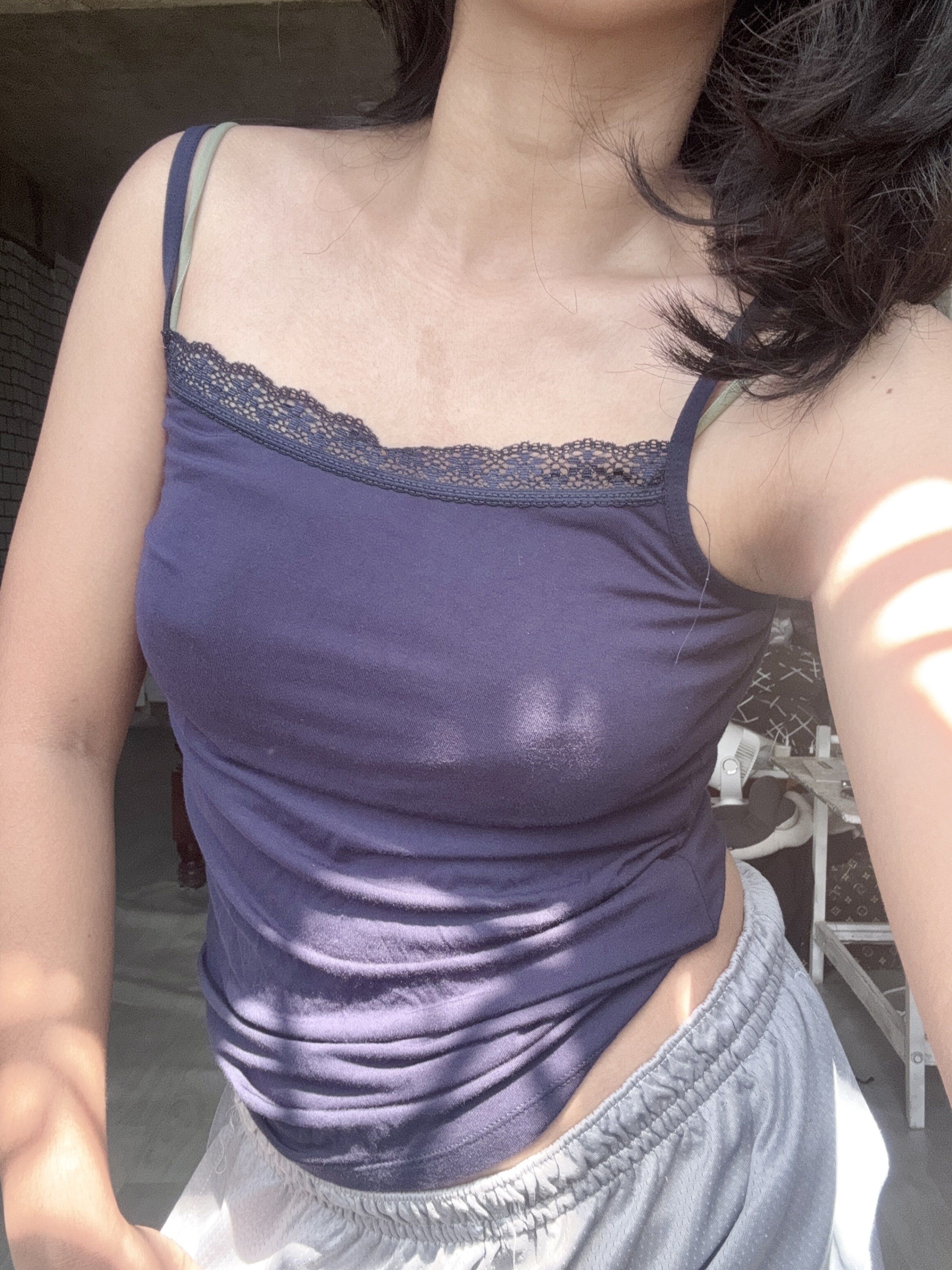 Navy Blue Lace Trim Tank Top (Category: Sleeveless) located in Manaoag. Submitted by park.chim (Listing ID 1421968956, Image 3). Description: - Navy blue tank top - Delicate lace trim on neckline - Thin spaghetti straps - Simple, fitted design - Made from soft, lightweight fabric - Ideal for warm weather - Versatile and easy to style.