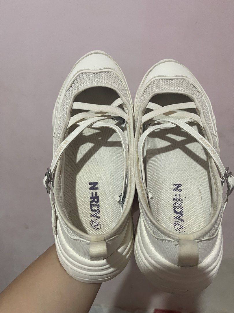 Nerdy Mary Jane Sneakers (Category: Sneakers) located in Manila. Submitted by momscollection.ph (Listing ID 1422057154, Image 1). Description: - White nerdy Mary Jane sneakers - Chunky sole - Mesh detailing - Buckle closure - Brand logo on strap - Pull tab for easy wear - Sporty and feminine design.