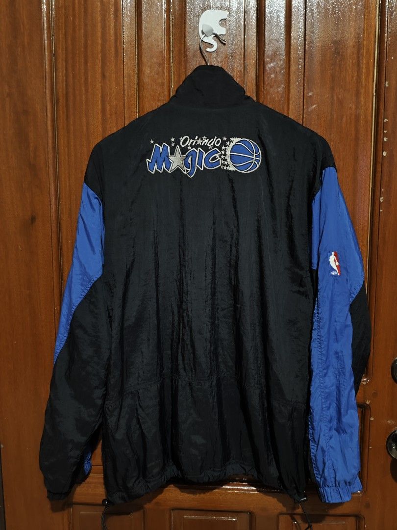 Nike Orlando Magic Jacket Small (Category: Coats, Jackets and Outerwear) located in Borongan. Submitted by thrifthappens.ph (Listing ID 1422025445, Image 2). Description: - Vintage Nike jacket - Orlando Magic logo on the back - Black and blue color scheme - Small Nike logo on the front - Full zip closure - Stand-up collar - Made in China Orlando Magic Starter Jacket Excellent Condition Dimes: 23x29 No Issue Need Wash 1500 + sf.