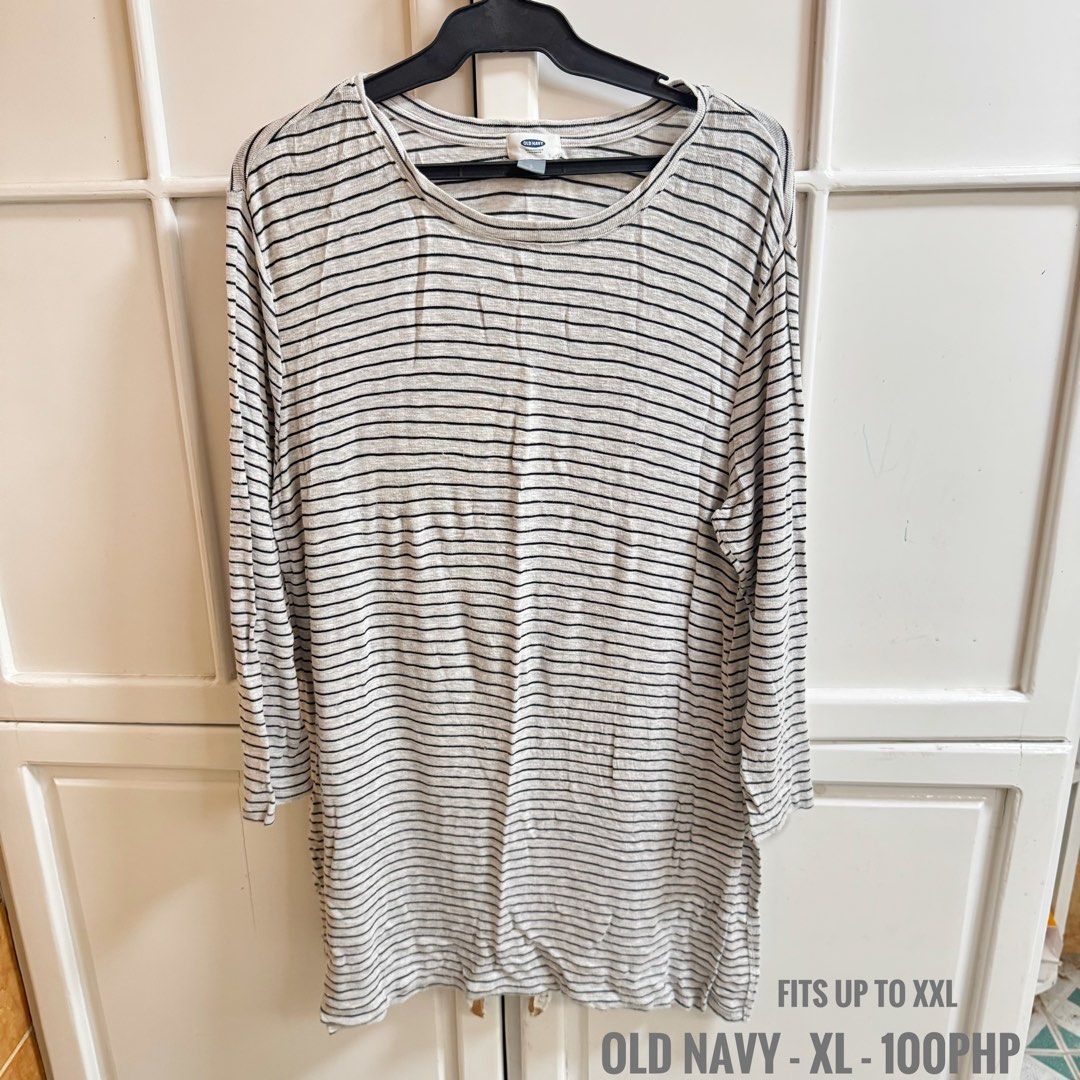 Old Navy Striped T-shirt XL (Category: Dresses) located in Binan City. Submitted by lealmeda (Listing ID 1422072345, Image 1). Description: - Old Navy striped long-sleeved t-shirt - Gray with black stripes - Round neck - Size: XL (fits up to XXL) - Condition: Good.